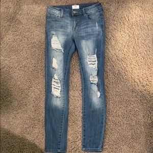 Sculpting skinny, distressed jeans
